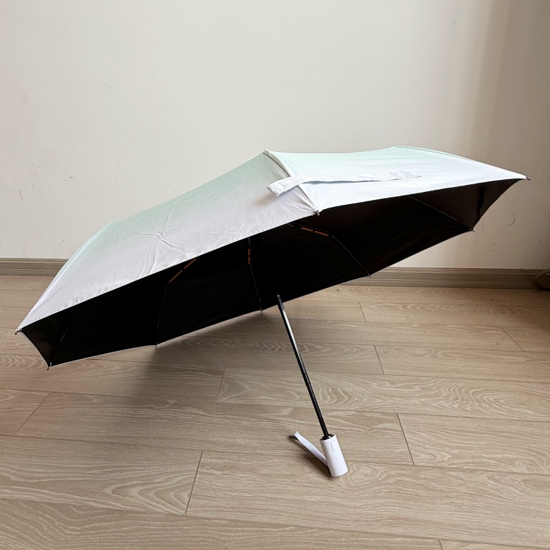 Paraguas plegable automático para sol y lluvia.