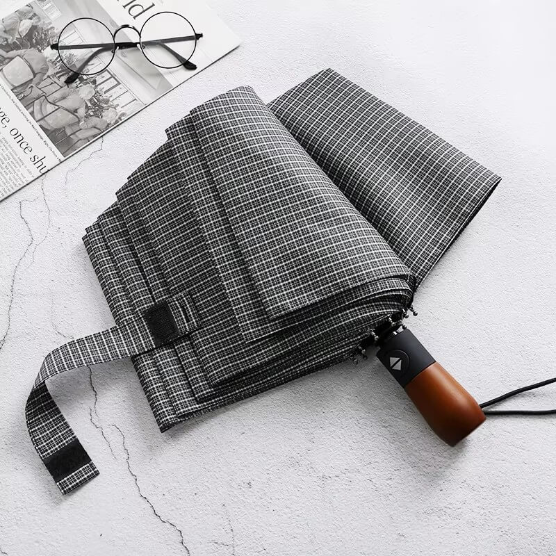 Paraguas plegable clásico con estampado de cuadros de pata de gallo