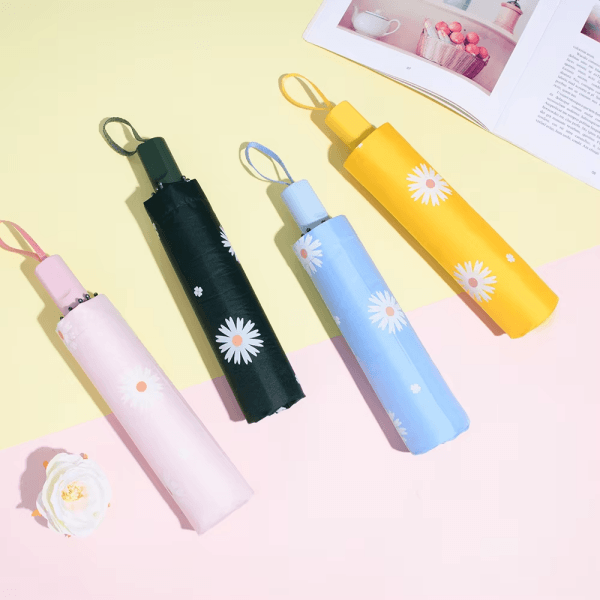 Precioso paraguas plegable con estampado de margaritas